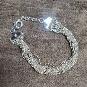 Elegant Silver and Gold Multi-Strand Bracelet